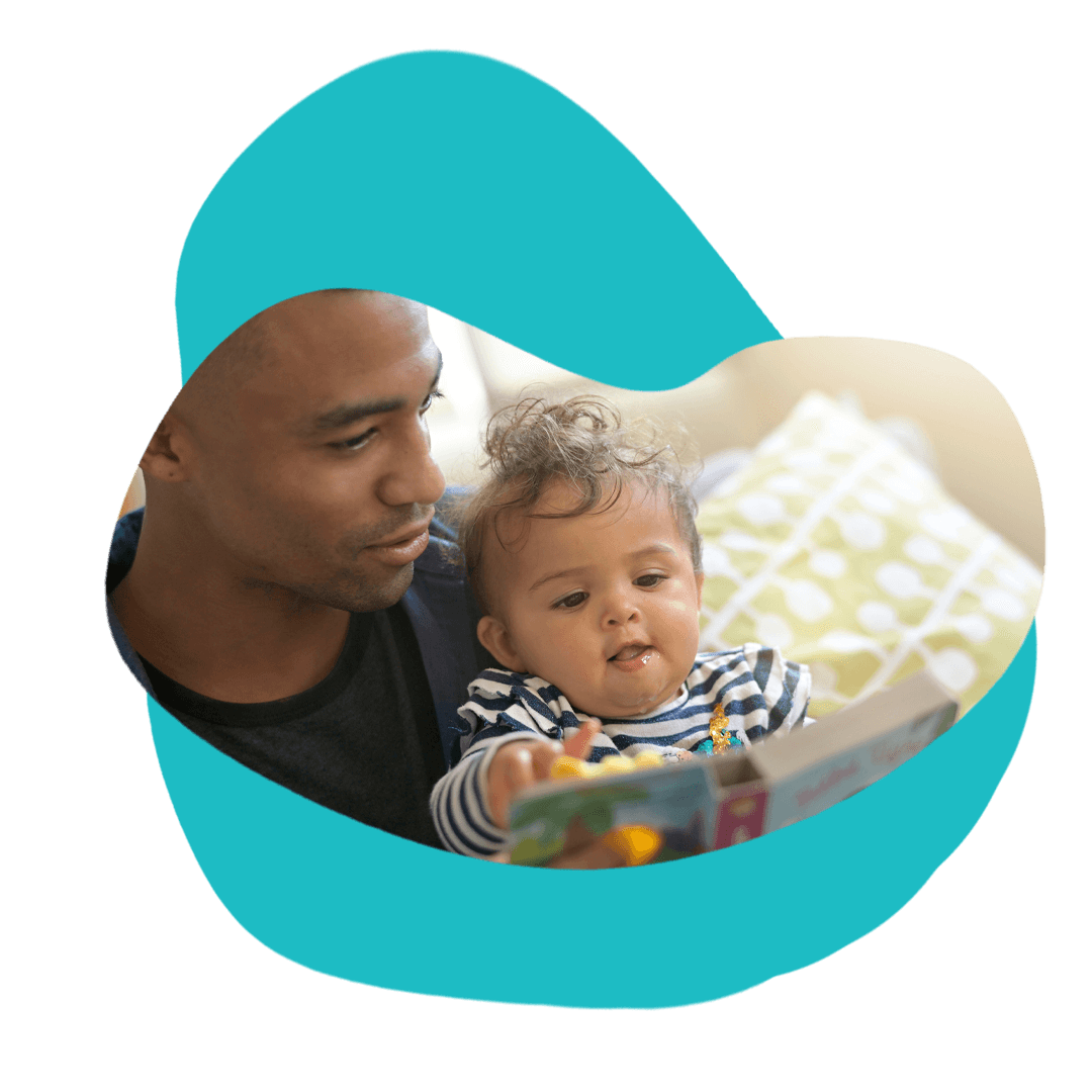 Father reading to baby