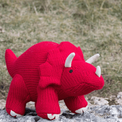 Image showing the Knitted Triceratops Soft Toy, Red product.