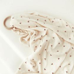 Image showing the The Cherry Muslin Swaddle Blanket, Cream product.