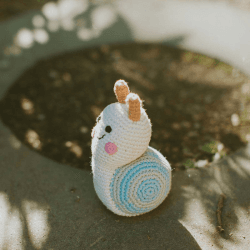 Image showing the Snail Rattle, Cream product.