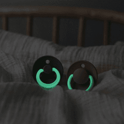 Image showing the Colour Glow Pack of 2 Round Natural Rubber Latex Night Dummies, 0 Months+, Vanilla Glow / Dark Oak Glow product.