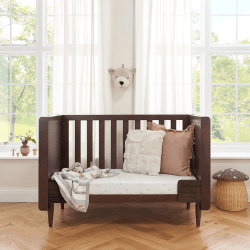 Image showing the Japandi Mini Cot Bed, Warm Walnut product.