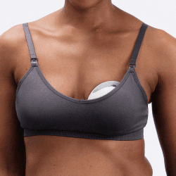 Image showing the Elvie Curve Manual One-Press Breast Pump, White product.