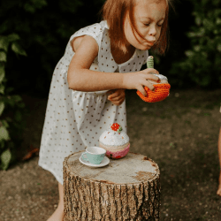 Image showing the Friendly Strawberry Cupcake Rattle product.