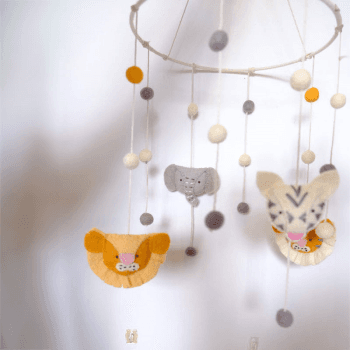Image showing the Jungle Mask Heads Felt Mobile, Grey/Orange product.